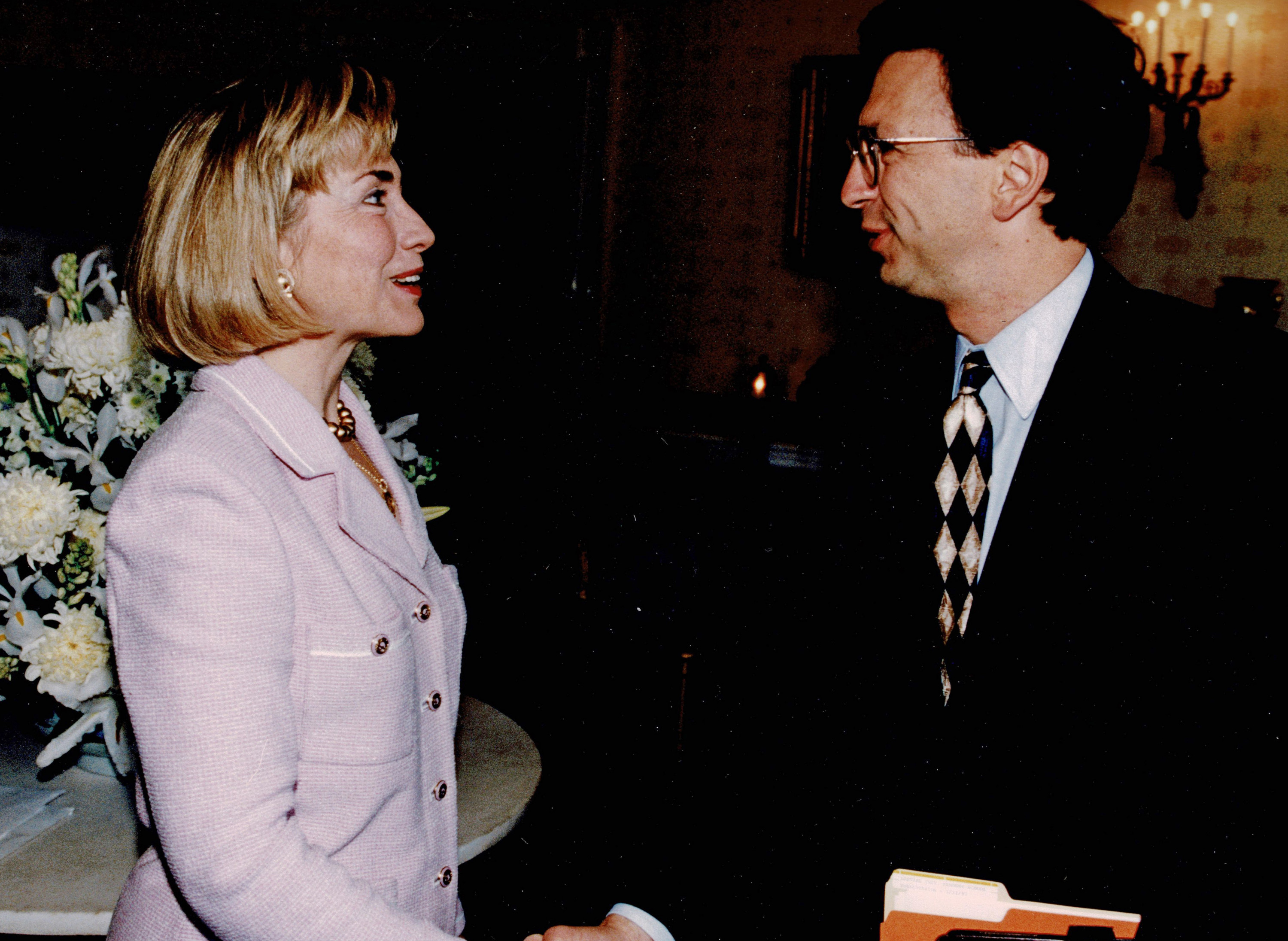 Then-First Lady Hillary Rodham Clinton talks with Sesno at the White House. Her first Sunday talk show interview was on CNN&#039;s Late Edition with Frank Sesno.